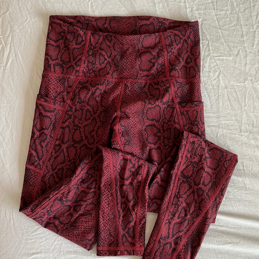 Red reptile pocket leggings- Champion brand